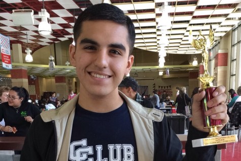 Sophomore Daniel Guerra holds 1st Place Calculator Applications trophy